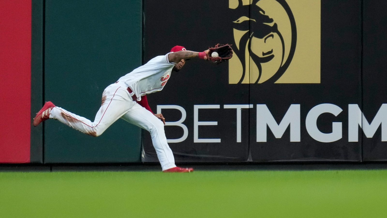 Cincinnati Reds right fielder Will Benson (30) catch up to a hard-hit line drive off the bat of Seattle Mariners shortstop J.P. Crawford (3) in the third inning of the MLB interleague between the Cincinnati Reds and the Seattle Mariners at Great American Ball Park in downtown Cincinnati on Tuesday, Sept. 5, 2023. The Mariners led 2-1 after three seasons.