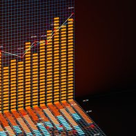 Business chart with line graph, bar chart and numbers on dark background, 3d rendering. Computer digital drawing. © Imagn Images via Vecteezy.com
