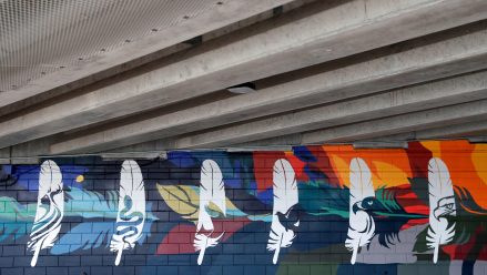 A 130-foot mural located beneath Ray Nischke Memorial Bridge features 12 feathers representing each of the Ho-Chunk Nation's clans. A dedication ceremony was held on Aug. 29, 2024, in Green Bay, Wis.