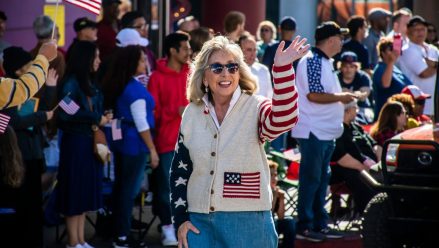 dina titus waving