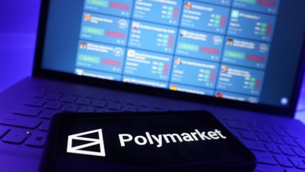polymarket-logo-phone-computer-background