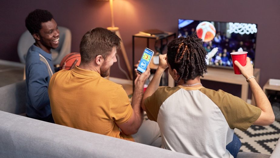 three-guys-watch-basketball-bet