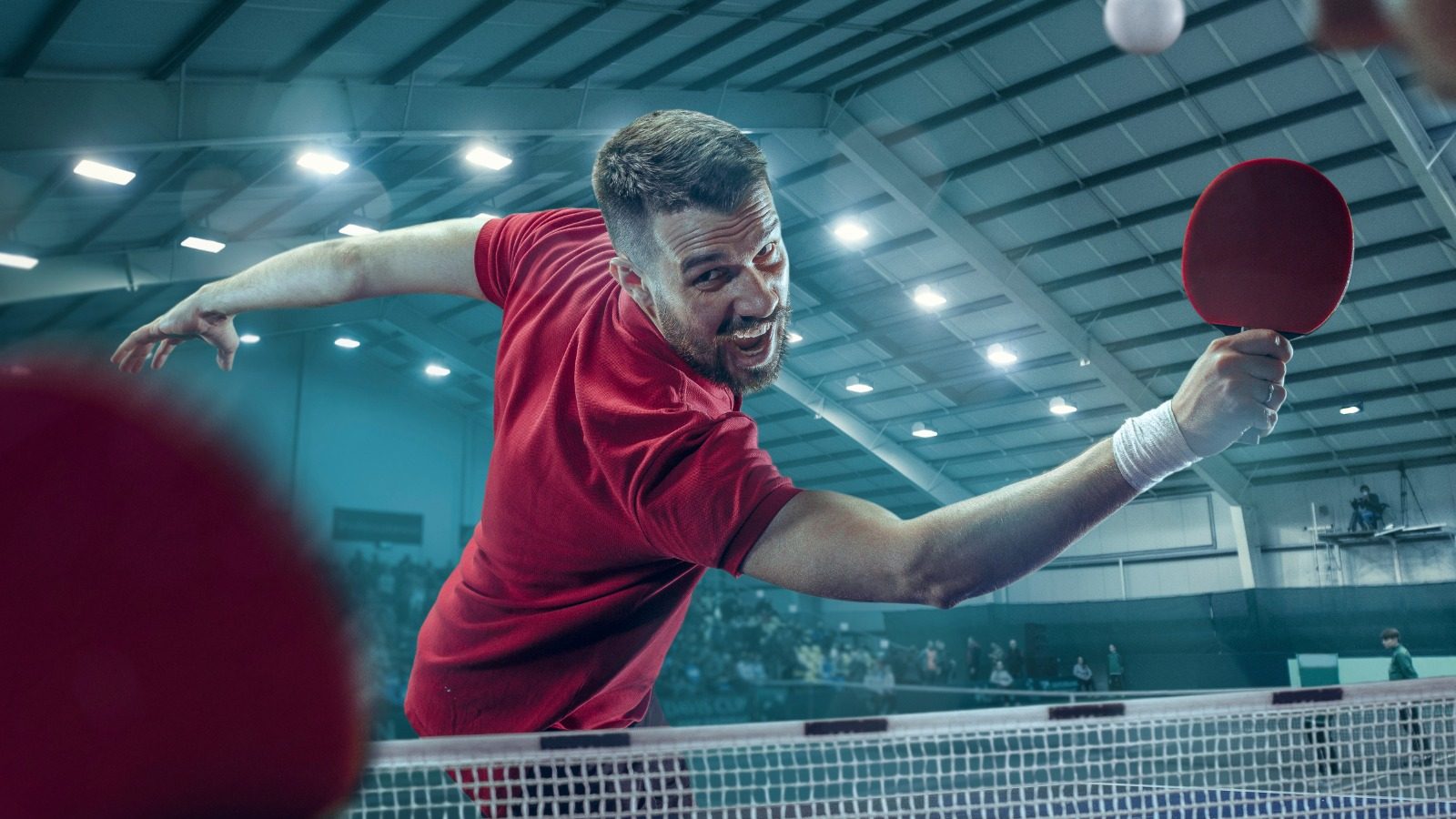 man-playing-table-tennis