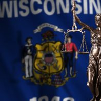 wisconsin-flag-scales-justice