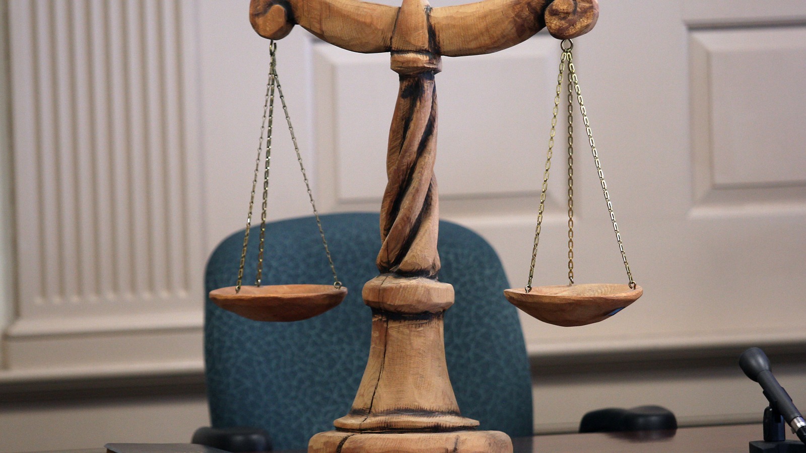 wood-carved-scales-justice