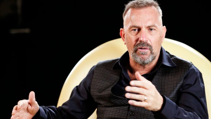 kevin-costner-yellow-chair-talking