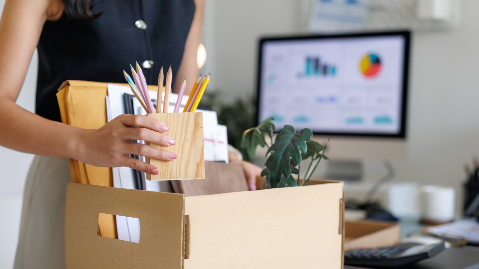 woman-packing-box-office