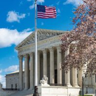 supreme-court-building-flag-cherry-blossoms